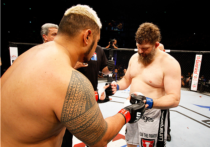 SAITAMA, JAPAN - SEPTEMBER 20: (L to R) Mark Hunt and Roy Nelson touch gloves before their heavyweight bout during the UFC Fight Night event inside the Saitama Arena on September 20, 2014 in Saitama, Japan. (Photo by Mitch Viquez/Zuffa LLC/Zuffa LLC via Getty Images)