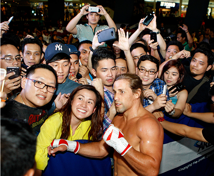 PASAY, PHILIPPINES - MAY 13: Urijah Faber interacts with fans during an open training session for fans and media at the Music Hall inside the Mall of Asia on May 13, 2015 in Pasay, Philippines. (Photo by Mitch Viquez/Zuffa LLC/Zuffa LLC via Getty Images)