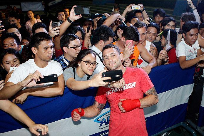 PASAY, PHILIPPINES - MAY 13: Fankie Edgar interacts with fans during an open training session for fans and media at the Music Hall inside the Mall of Asia on May 13, 2015 in Pasay, Philippines. (Photo by Mitch Viquez/Zuffa LLC/Zuffa LLC via Getty Images)