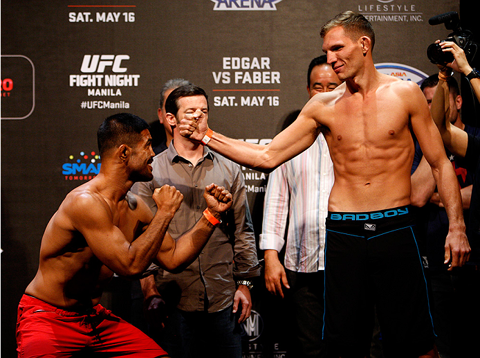 PASAY, METRO MANILA, PHILIPPINES - MAY 15: (L and R) Mark Munoz and Luke Barnatt face-off during the UFC weigh-in event at the Mall of Asia Arena on May 15, 2015 in Pasay, Metro Manila, Philippines. (Photo by Mitch Viquez/Zuffa LLC/Zuffa LLC via Getty Images)