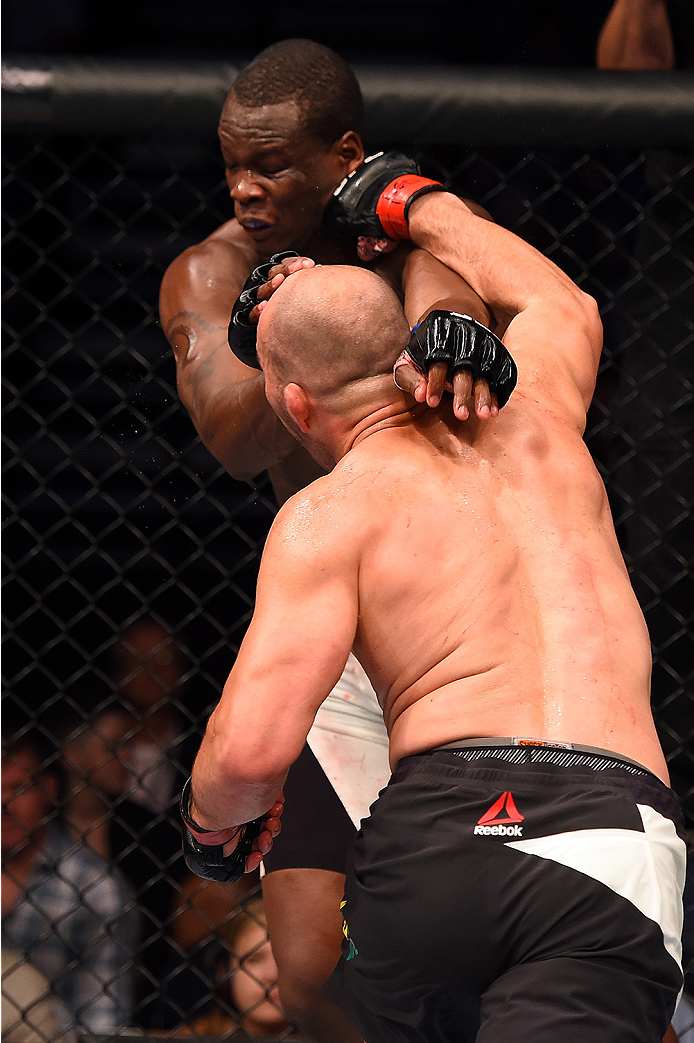Glover Teixeira of Brazil punches Ovince Saint Preux in their light heavyweight bout during the UFC Fight Night event at Bridgestone Arena on August 8, 2015 in Nashville, Tennessee. (Photo by Josh Hedges/Zuffa LLC)