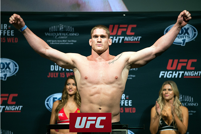 Todd Duffee steps on the scale during the UFC weigh-in at the Valley View Casino Center on July 14, 2015 in San Diego, California. (Photo by Jeff Bottari/Zuffa LLC)