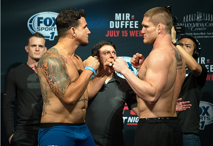 (L-R) Frank Mir and Todd Duffee face-off during the UFC weigh-in at the Valley View Casino Center on July 14, 2015 in San Diego, California. (Photo by Jeff Bottari/Zuffa LLC)