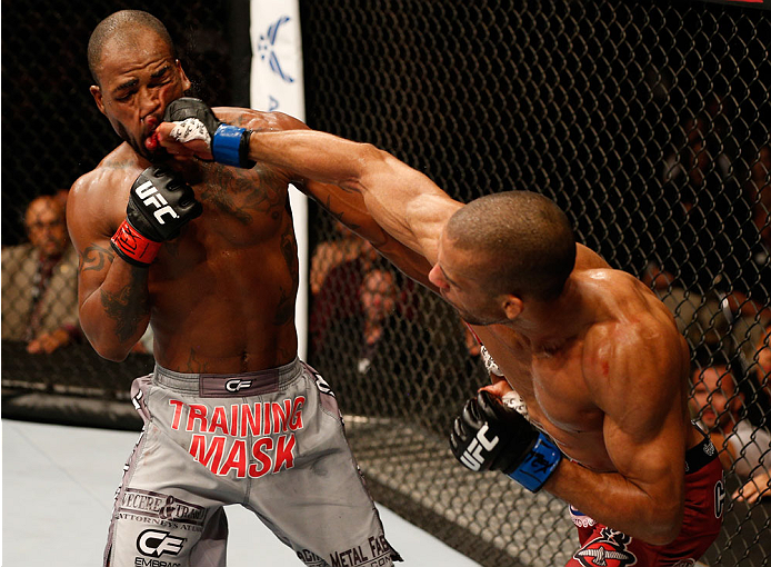 Edson Barboza of Brazil punches Bobby Green in their lightweight bout during the UFC Fight Night event at The Frank Erwin Center on November 22, 2014 in Austin, TX. (Photo by Josh Hedges/Zuffa LLC)