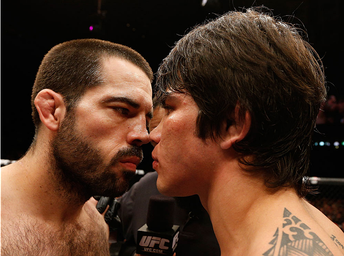 CINCINNATI, OH - MAY 10:  (L-R) Opponents Matt Brown and Erick Silva face off before their welterweight fight during the UFC Fight Night event at the U.S. Bank Arena on May 10, 2014 in Cincinnati, Ohio. (Photo by Josh Hedges/Zuffa LLC/Zuffa LLC via Getty Images)