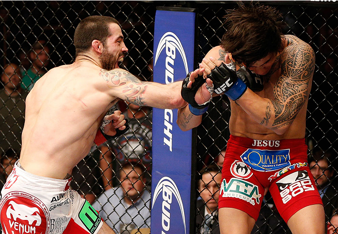CINCINNATI, OH - MAY 10: (L-R) Matt Brown punches Erick Silva in their welterweight fight during the UFC Fight Night event at the U.S. Bank Arena on May 10, 2014 in Cincinnati, Ohio. (Photo by Josh Hedges/Zuffa LLC/Zuffa LLC via Getty Images)