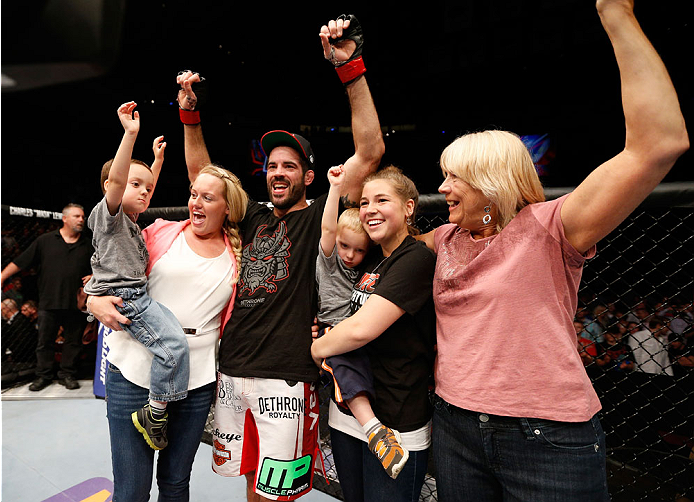 CINCINNATI, OH - MAY 10:  Matt Brown celebrates with his family after his TKO victory over Erick Silva in their welterweight fight during the UFC Fight Night event at the U.S. Bank Arena on May 10, 2014 in Cincinnati, Ohio. (Photo by Josh Hedges/Zuffa LLC/Zuffa LLC via Getty Images)