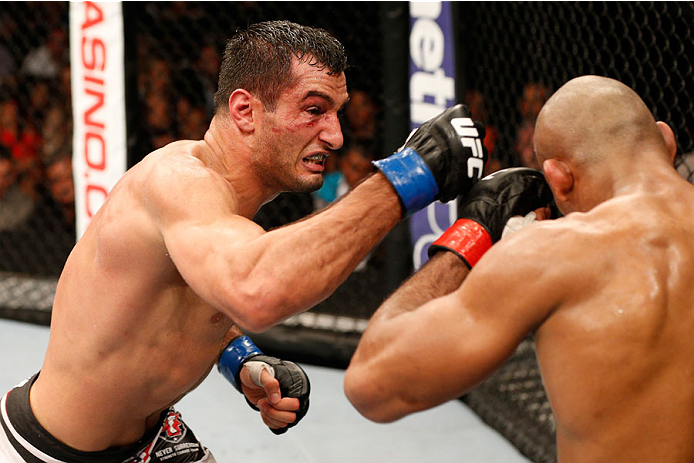 MASHANTUCKET, CT - SEPTEMBER 05:  (L-R) Gegard Mousasi punches Ronaldo 'Jacare' Souza in their middleweight bout during the UFC Fight Night event at Foxwoods Resort Casino on September 5, 2014 in Mashantucket, Connecticut.  (Photo by Josh Hedges/Zuffa LLC/Zuffa LLC via Getty Images)