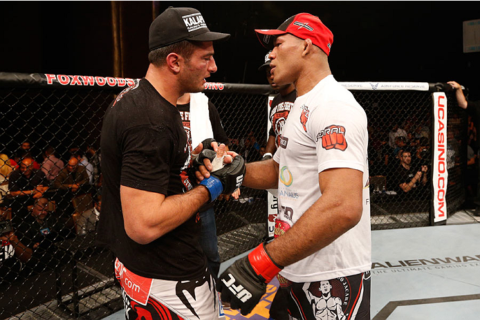 MASHANTUCKET, CT - SEPTEMBER 05:  (R-L) Ronaldo 'Jacare' Souza talks with Gegard Mousasi after defeating Mousasi in their middleweight bout during the UFC Fight Night event at Foxwoods Resort Casino on September 5, 2014 in Mashantucket, Connecticut.  (Photo by Josh Hedges/Zuffa LLC/Zuffa LLC via Getty Images)