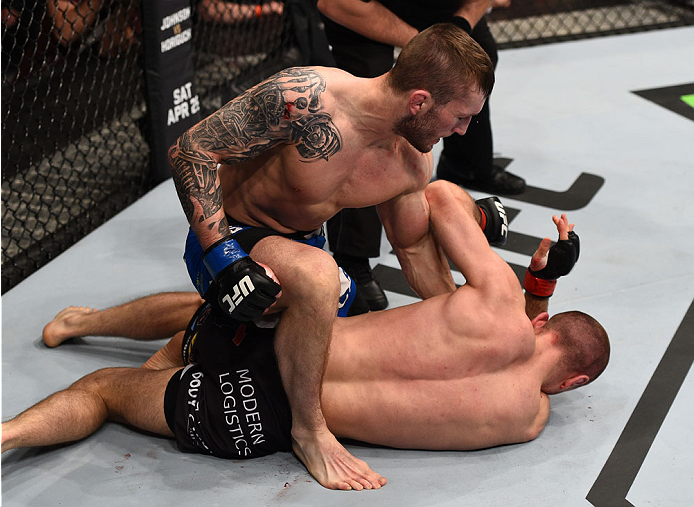 (L-R) Stevie Ray of Scotland defeats Marcin Bandel of Poland by TKO in their lightweight fight during the UFC Fight Night event at the Tauron Arena on April 11, 2015 in Krakow, Poland. (Photo by Jeff Bottari/Zuffa LLC)