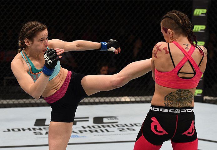 Maryna Moroz kicks Joanne Calderwood in their women's strawweight fight during the UFC Fight Night event at the Tauron Arena on April 11, 2015 in Krakow, Poland. (Photo by Jeff Bottari/Zuffa LLC)