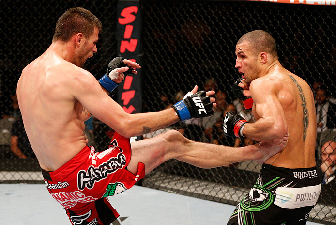 Means throws a leg kick at <a href='../fighter/Hernani-Perpetuo'>Hernani Perpetuo</a>