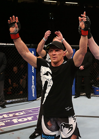 SEATTLE, WA - DECEMBER 08: Dennis Siver is declared the winner after his featherweight bout at the UFC on FOX event on December 8, 2012 at Key Arena in Seattle, Washington. (Photo by Ezra Shaw/Zuffa LLC/Zuffa LLC via Getty Images) *** Local Caption *** Dennis Siver