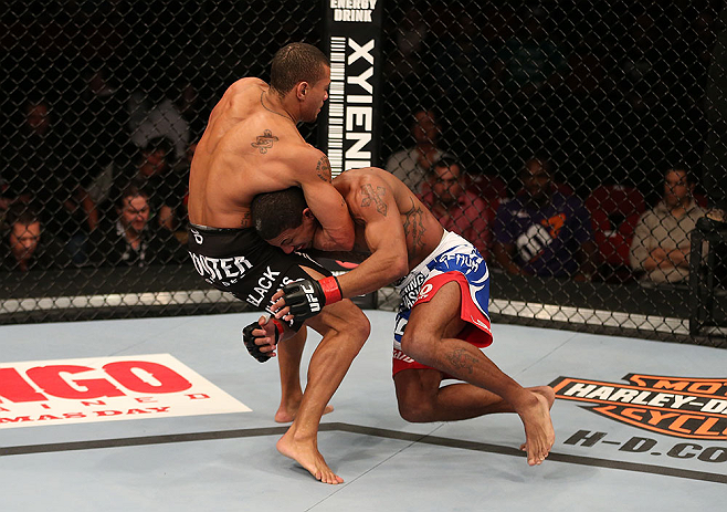 SEATTLE, WA - DECEMBER 08: Abel Trujillo (black shorts) attempts to submit Marcus LeVesseur during their lightweight bout at the UFC on FOX event on December 8, 2012 at Key Arena in Seattle, Washington. (Photo by Ezra Shaw/Zuffa LLC/Zuffa LLC via Getty Images) *** Local Caption *** Marcus LeVesseur; Abel Trujillo