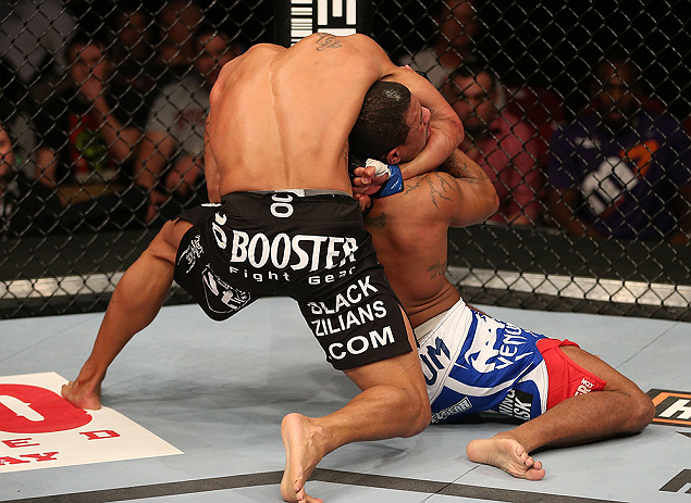 SEATTLE, WA - DECEMBER 08: Abel Trujillo (black shorts) attempts to submit Marcus LeVesseur during their lightweight bout at the UFC on FOX event on December 8, 2012 at Key Arena in Seattle, Washington. (Photo by Ezra Shaw/Zuffa LLC/Zuffa LLC via Getty Images) *** Local Caption *** Marcus LeVesseur; Abel Trujillo