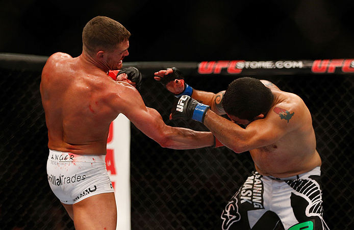 SEATTLE, WA - DECEMBER 08: (L-R) Daron Cruickshank kicks Henry Martinez during their lightweight bout at the UFC on FOX event on December 8, 2012 at Key Arena in Seattle, Washington. (Photo by Ezra Shaw/Zuffa LLC/Zuffa LLC via Getty Images) *** Local Caption *** Daron Cruickshank; Henry Martinez