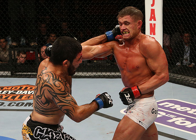 SEATTLE, WA - DECEMBER 08: (L-R) Henry Martinez punches Daron Cruickshank during their lightweight bout at the UFC on FOX event on December 8, 2012 at Key Arena in Seattle, Washington. (Photo by Ezra Shaw/Zuffa LLC/Zuffa LLC via Getty Images) *** Local Caption *** Daron Cruickshank; Henry Martinez