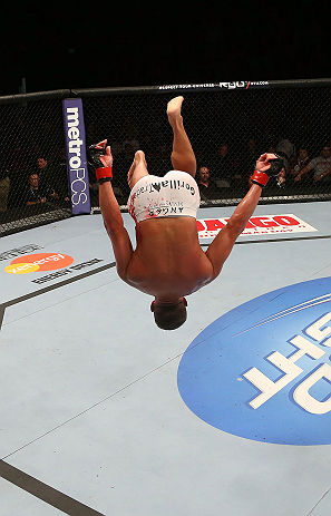 SEATTLE, WA - DECEMBER 08: Daron Cruickshank does a backflip after his knockout victory over Henry Martinez during their lightweight bout at the UFC on FOX event on December 8, 2012 at Key Arena in Seattle, Washington. (Photo by Ezra Shaw/Zuffa LLC/Zuffa LLC via Getty Images) *** Local Caption *** Daron Cruickshank; Henry Martinez