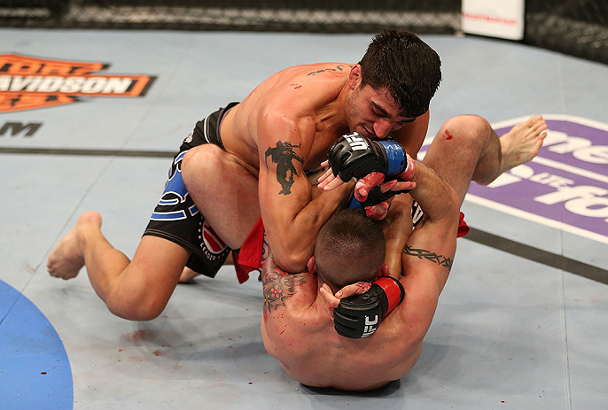 SEATTLE, WA - DECEMBER 08: Ramsey Nijem (top) elbows Joe Proctor during their lightweight bout at the UFC on FOX event on December 8, 2012 at Key Arena in Seattle, Washington. (Photo by Ezra Shaw/Zuffa LLC/Zuffa LLC via Getty Images) *** Local Caption *** Ramsey Nijem; Joe Proctor