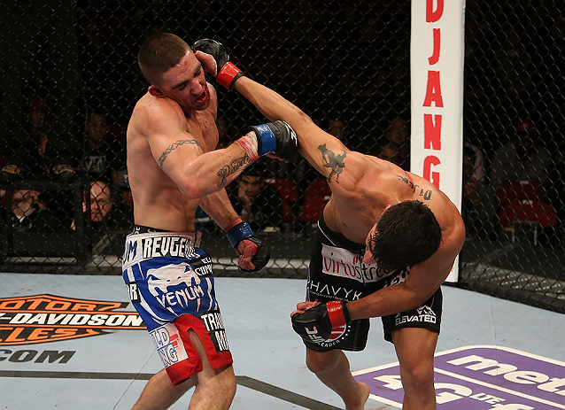 SEATTLE, WA - DECEMBER 08: (R-L) Ramsey Nijem punches Joe Proctor during their lightweight bout at the UFC on FOX event on December 8, 2012 at Key Arena in Seattle, Washington. (Photo by Ezra Shaw/Zuffa LLC/Zuffa LLC via Getty Images) *** Local Caption *** Ramsey Nijem; Joe Proctor