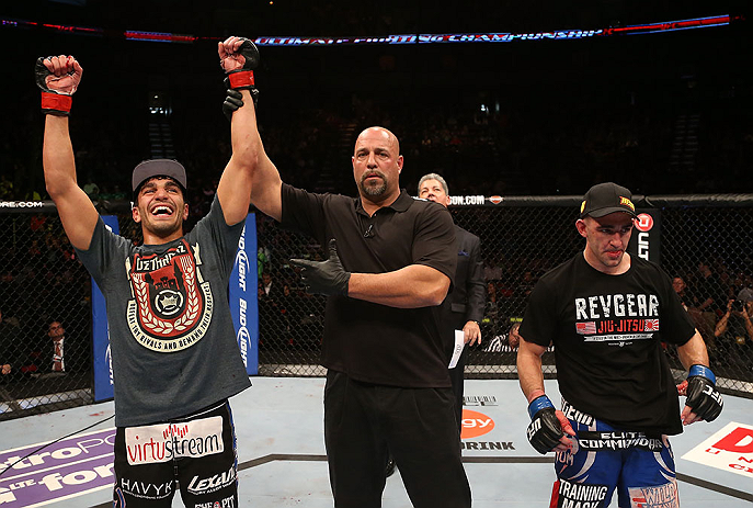 SEATTLE, WA - DECEMBER 08: Ramsey Nijem (left) reacts to being declared the winner over Joe Proctor (right) after their lightweight bout at the UFC on FOX event on December 8, 2012 at Key Arena in Seattle, Washington. (Photo by Ezra Shaw/Zuffa LLC/Zuffa LLC via Getty Images) *** Local Caption *** Ramsey Nijem; Joe Proctor