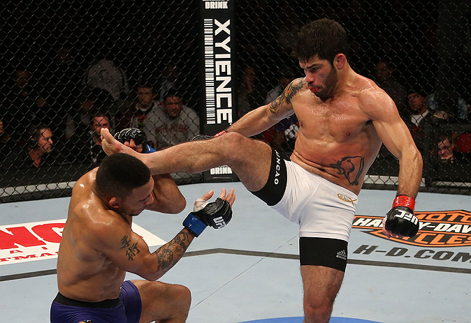 SEATTLE, WA - DECEMBER 08: (R-L) Raphael Assuncao kicks Mike Easton during their bantamweight bout at the UFC on FOX event on December 8, 2012 at Key Arena in Seattle, Washington. (Photo by Ezra Shaw/Zuffa LLC/Zuffa LLC via Getty Images) *** Local Caption *** Raphael Assuncao; Mike Easton