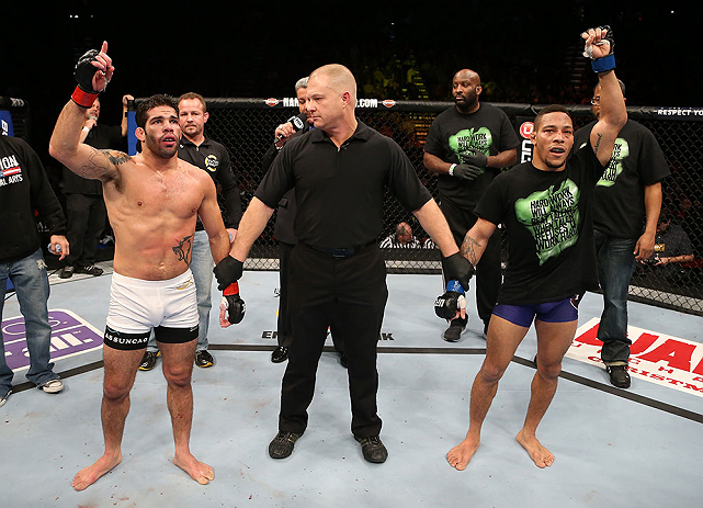 SEATTLE, WA - DECEMBER 08: Raphael Assuncao (left) and Raphael Assuncao await the official decision after their bantamweight bout at the UFC on FOX event on December 8, 2012 at Key Arena in Seattle, Washington. (Photo by Ezra Shaw/Zuffa LLC/Zuffa LLC via Getty Images) *** Local Caption *** Raphael Assuncao; Mike Easton