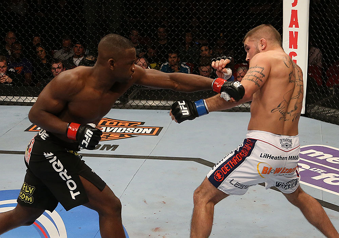 SEATTLE, WA - DECEMBER 08: (L-R) Yves Edwards punches Jeremy Stephens during their lightweight bout at the UFC on FOX event on December 8, 2012 at Key Arena in Seattle, Washington. (Photo by Ezra Shaw/Zuffa LLC/Zuffa LLC via Getty Images) *** Local Caption *** Yves Edwards; Jeremy Stephens