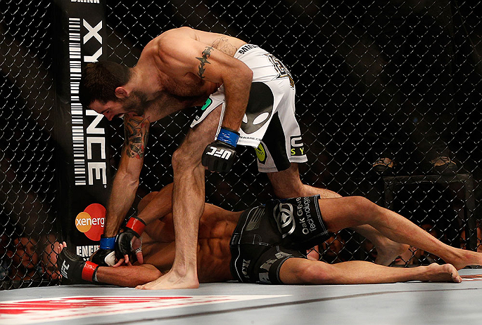 SEATTLE, WA - DECEMBER 08: Matt Brown (top) punches Mike Swick during their welterweight bout at the UFC on FOX event on December 8, 2012 at Key Arena in Seattle, Washington. (Photo by Ezra Shaw/Zuffa LLC/Zuffa LLC via Getty Images) *** Local Caption *** Mike Swick; Matt Brown