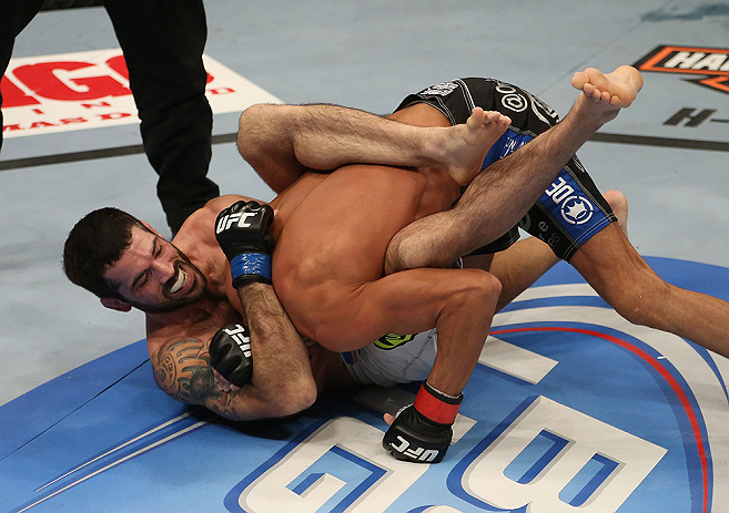SEATTLE, WA - DECEMBER 08: Matt Brown (R) atttempts to submit Mike Swick during their welterweight bout at the UFC on FOX event on December 8, 2012 at Key Arena in Seattle, Washington. (Photo by Ezra Shaw/Zuffa LLC/Zuffa LLC via Getty Images) *** Local Caption *** Mike Swick; Matt Brown