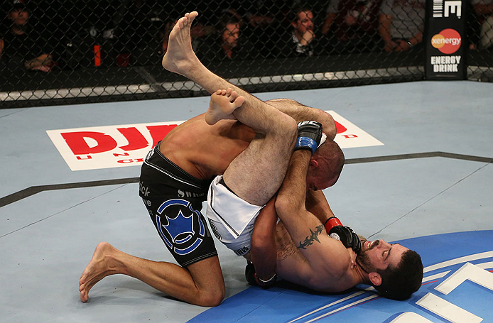 SEATTLE, WA - DECEMBER 08: Matt Brown (R) atttempts to submit Mike Swick during their welterweight bout at the UFC on FOX event on December 8, 2012 at Key Arena in Seattle, Washington. (Photo by Ezra Shaw/Zuffa LLC/Zuffa LLC via Getty Images) *** Local Caption *** Mike Swick; Matt Brown