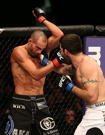 SEATTLE, WA - DECEMBER 08: (R-L) Matt Brown punches Mike Swick during their welterweight bout at the UFC on FOX event on December 8, 2012 at Key Arena in Seattle, Washington. (Photo by Ezra Shaw/Zuffa LLC/Zuffa LLC via Getty Images) *** Local Caption *** Mike Swick; Matt Brown