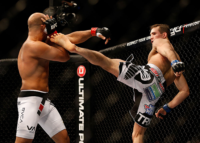 SEATTLE, WA - DECEMBER 08: (R-L) Rory MacDonald kicks BJ Penn during their welterweight bout at the UFC on FOX event on December 8, 2012 at Key Arena in Seattle, Washington. (Photo by Josh Hedges/Zuffa LLC/Zuffa LLC via Getty Images) *** Local Caption *** BJ Penn; Rory MacDonald