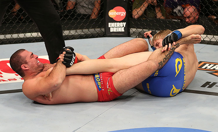 SEATTLE, WA - DECEMBER 08: (L-R) Mauricio Rua attempts to submit Alexander Gustafsson during their light heavyweight bout at the UFC on FOX event on December 8, 2012 at Key Arena in Seattle, Washington. (Photo by Ezra Shaw/Zuffa LLC/Zuffa LLC via Getty Images) *** Local Caption *** Mauricio Rua; Alexander Gustafsson