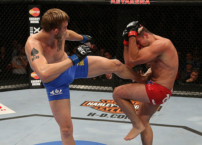 SEATTLE, WA - DECEMBER 08: (L-R) Alexander Gustafsson kicks Mauricio Rua during their light heavyweight bout at the UFC on FOX event on December 8, 2012 at Key Arena in Seattle, Washington. (Photo by Ezra Shaw/Zuffa LLC/Zuffa LLC via Getty Images) *** Local Caption *** Mauricio Rua; Alexander Gustafsson