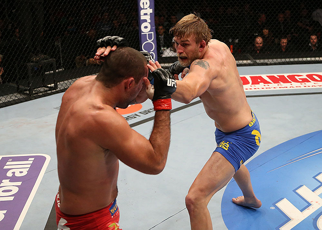 SEATTLE, WA - DECEMBER 08: (R-L) Alexander Gustafsson punches Mauricio Rua during their light heavyweight bout at the UFC on FOX event on December 8, 2012 at Key Arena in Seattle, Washington. (Photo by Ezra Shaw/Zuffa LLC/Zuffa LLC via Getty Images) *** Local Caption *** Mauricio Rua; Alexander Gustafsson