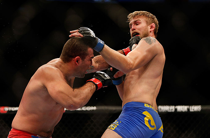 SEATTLE, WA - DECEMBER 08: Mauricio Rua (left) punches Alexander Gustafsson (right) during their light heavyweight bout at the UFC on FOX event on December 8, 2012 at Key Arena in Seattle, Washington. (Photo by Josh Hedges/Zuffa LLC/Zuffa LLC via Getty Images) *** Local Caption *** Mauricio Rua; Alexander Gustafsson