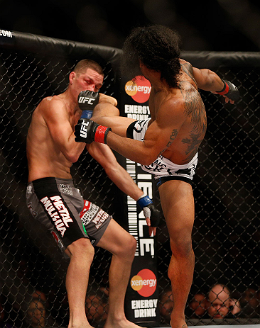 SEATTLE, WA - DECEMBER 08: Benson Henderson (R) kicks Nate Diaz (L) during their lightweight championship bout at the UFC on FOX event on December 8, 2012 at Key Arena in Seattle, Washington. (Photo by Josh Hedges/Zuffa LLC/Zuffa LLC via Getty Images) *** Local Caption *** Benson Henderson; Nate Diaz