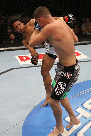 SEATTLE, WA - DECEMBER 08: Benson Henderson (white trunks) kicks Nate Diaz during their lightweight championship bout at the UFC on FOX event on December 8, 2012 at Key Arena in Seattle, Washington. (Photo by Ezra Shaw/Zuffa LLC/Zuffa LLC via Getty Images) *** Local Caption *** Benson Henderson; Nate Diaz