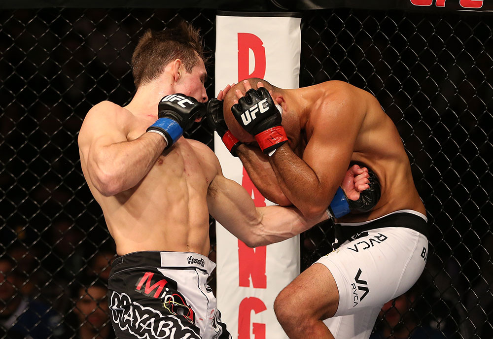 SEATTLE, WA - DECEMBER 08: (L-R) Rory MacDonald punches BJ Penn during their welterweight bout at the UFC on FOX event on December 8, 2012 at Key Arena in Seattle, Washington. (Photo by Ezra Shaw/Zuffa LLC/Zuffa LLC via Getty Images) *** Local Caption *** BJ Penn; Rory MacDonald