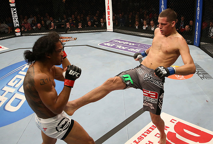 SEATTLE, WA - DECEMBER 08: (R-L) Nate Diaz kicks Benson Henderson during their lightweight championship bout at the UFC on FOX event on December 8, 2012 at Key Arena in Seattle, Washington. (Photo by Ezra Shaw/Zuffa LLC/Zuffa LLC via Getty Images) *** Local Caption *** Benson Henderson; Nate Diaz