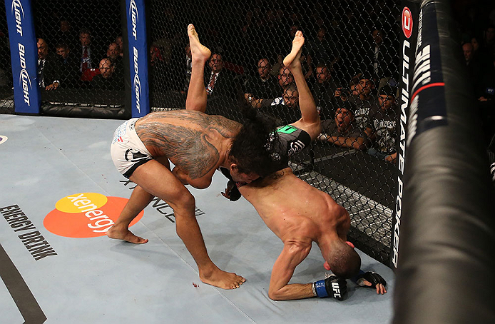 SEATTLE, WA - DECEMBER 08: Benson Henderson (left) slams Nate Diaz (right) during their lightweight championship bout at the UFC on FOX event on December 8, 2012 at Key Arena in Seattle, Washington. (Photo by Ezra Shaw/Zuffa LLC/Zuffa LLC via Getty Images) *** Local Caption *** Benson Henderson; Nate Diaz