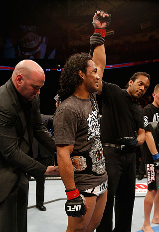 SEATTLE, WA - DECEMBER 08: Benson Henderson has his hand raised after his victory over Nate Diaz in their lightweight championship bout at the UFC on FOX event on December 8, 2012 at Key Arena in Seattle, Washington. (Photo by Josh Hedges/Zuffa LLC/Zuffa LLC via Getty Images) *** Local Caption *** Benson Henderson; Nate Diaz