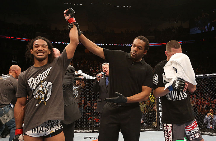 SEATTLE, WA - DECEMBER 08: Benson Henderson (left) reacts to his victory over Nate Diaz (right) after their lightweight championship bout at the UFC on FOX event on December 8, 2012 at Key Arena in Seattle, Washington. (Photo by Ezra Shaw/Zuffa LLC/Zuffa LLC via Getty Images) *** Local Caption *** Benson Henderson; Nate Diaz