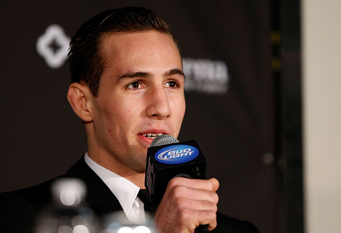 SEATTLE, WA - DECEMBER 06: Rory MacDonald interacts with media during the UFC on FOX press conference on December 6, 2012 at Key Arena in Seattle, Washington. (Photo by Josh Hedges/Zuffa LLC/Zuffa LLC via Getty Images)