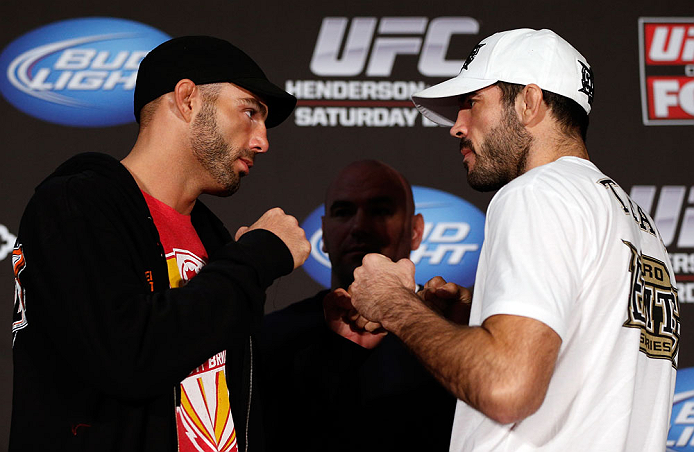 SEATTLE, WA - DECEMBER 06: (L-R) Opponents Mike Swick and Matt Brown face off during the UFC on FOX press conference on December 6, 2012 at Key Arena in Seattle, Washington. (Photo by Josh Hedges/Zuffa LLC/Zuffa LLC via Getty Images)