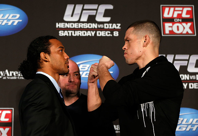 SEATTLE, WA - DECEMBER 06: (L-R) Opponents Benson Henderson and Nate Diaz face off during the UFC on FOX press conference on December 6, 2012 at Key Arena in Seattle, Washington. (Photo by Josh Hedges/Zuffa LLC/Zuffa LLC via Getty Images)