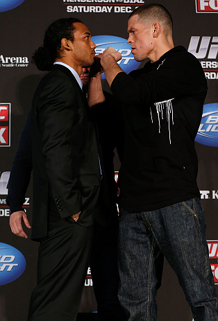 SEATTLE, WA - DECEMBER 06: (L-R) Opponents Benson Henderson and Nate Diaz face off during the UFC on FOX press conference on December 6, 2012 at Key Arena in Seattle, Washington. (Photo by Josh Hedges/Zuffa LLC/Zuffa LLC via Getty Images)