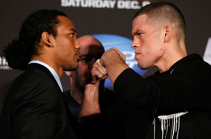 SEATTLE, WA - DECEMBER 06: (L-R) Opponents Benson Henderson and Nate Diaz face off during the UFC on FOX press conference on December 6, 2012 at Key Arena in Seattle, Washington. (Photo by Josh Hedges/Zuffa LLC/Zuffa LLC via Getty Images)