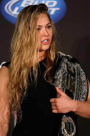 SEATTLE, WA - DECEMBER 06: Ronda Rousey poses for photos after being presented with the UFC women's bantamweight championship during the UFC on FOX press conference on December 6, 2012 at Key Arena in Seattle, Washington. (Photo by Josh Hedges/Zuffa LLC/Zuffa LLC via Getty Images)